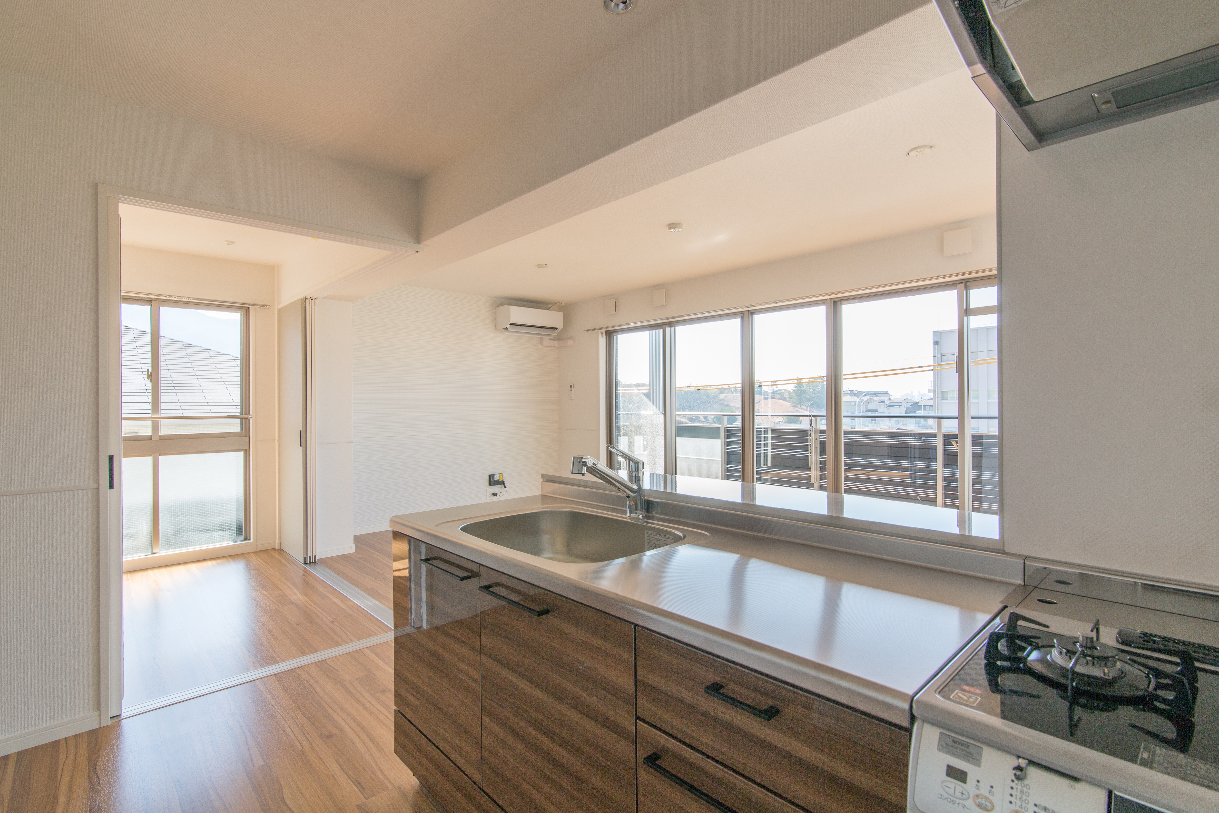 Bright condo kitchen and living room